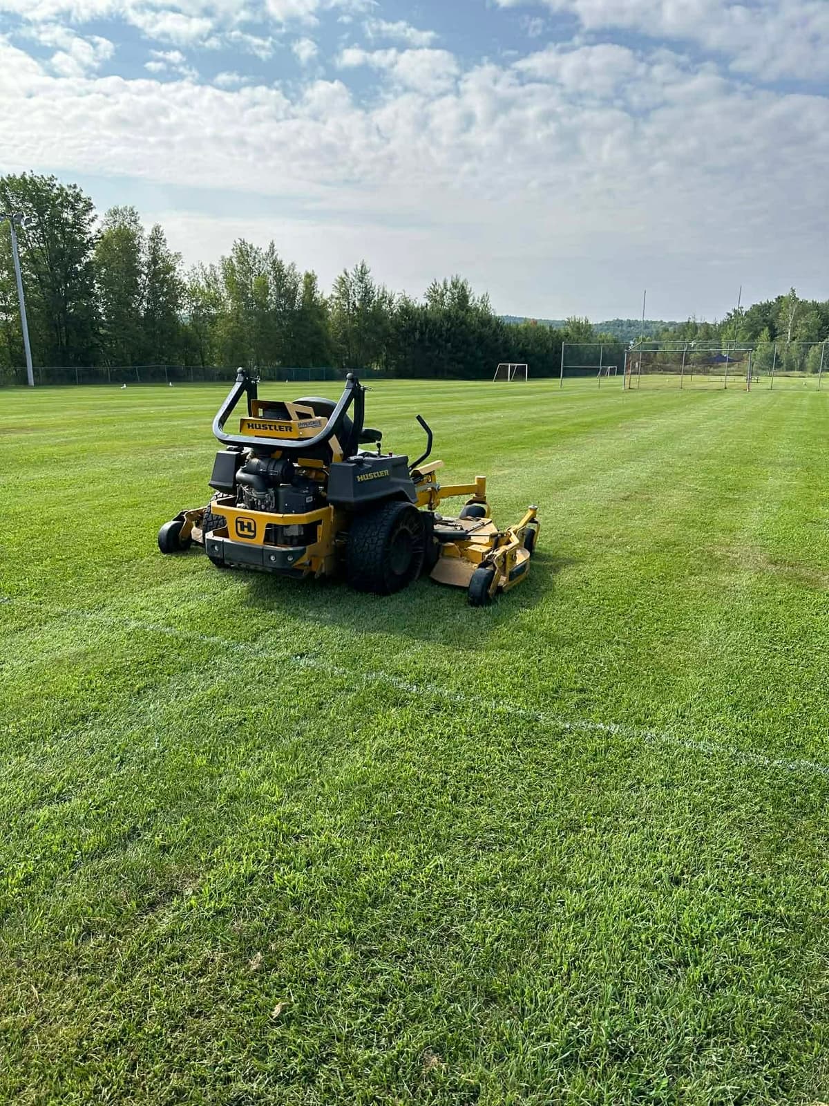 Mower on a large field